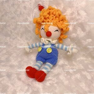 Handmade Colorful Crocheted Clown – A Playful Bundle of Joy!